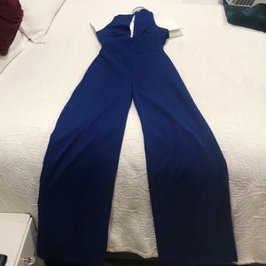 Lulu’s royal blue, cross back jumpsuit. Worn once!